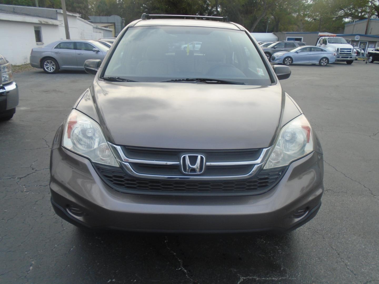 2011 GRAY HONDA CR-V (3CZRE3H34BG) with an L4 2.4L engine, CVT transmission, located at 6112 N Florida Avenue, Tampa, FL, 33604, (888) 521-5131, 27.954929, -82.459534 - Photo#1